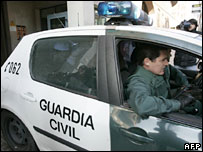 Spanish police with one of the suspects - 19/1/08