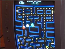 TV showing Pac Man turned on its side