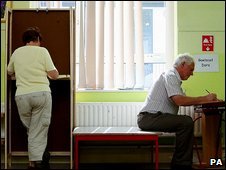 Voter votes in the European and local elections