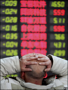 Market trader with his hands on his head (Image: AP)