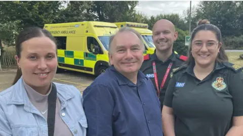 Ian Marples and the ambulance crew who saved his life 