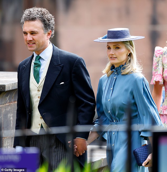 For the wedding of the Duke of Westminster and Olivia Henson, Lucy selected a slate blue silk dress, elevated by £92 nude platform heels from Nine West, a navy straw boater and matching £45 weaved clutch bag by John Lewis