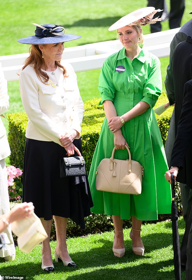 At Royal Ascot, she sported a vibrant green poplin shirt dress by Jonathan Simkhai, priced at £445, with a floral fascinator, Zara 'City' bag and her reliable platforms. Pictured with Sarah Ferguson (left)