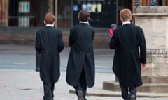 Three schoolboys wearing tailcoats