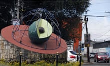 A sculpture of an avocado at the town's entrance in Ziracuaretiro, Michoacán. Photograph: Marco Ugarte/AP