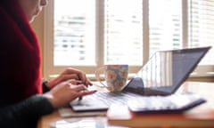 A woman working from home on her laptop