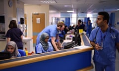 NHS staff using computers.