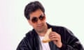 Ed Miliband holding a bacon sandwich