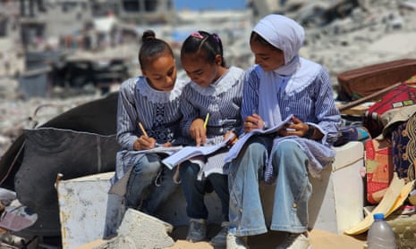 Pupils continue to learn in a ‘tent school’ among the rubble in Khan Younis, Gaza, 3 September 2024.