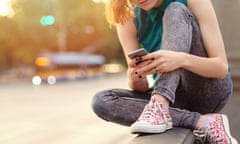 Teenage girl using a smartphone