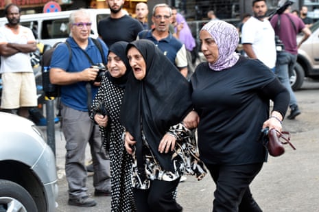 Friends and relatives of injured people arrive at the American University of Beirut Medical Center (AUBMC) after an incident involving Hezbollah members' wireless devices in Beirut, Lebanon, 17 September 2024.