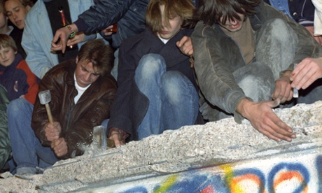 West Berliners chipping away at the Berlin Wall, Germany.  10 November 1989.