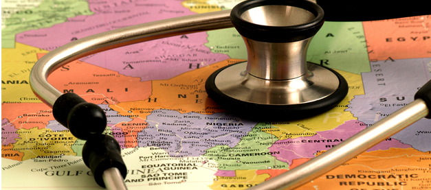 Doctor stethoscope resting on top of a world map