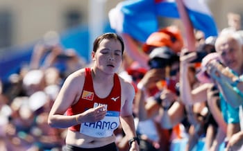 Kinzang Lhamo limps towards the finish line in the Olympic women's marathon