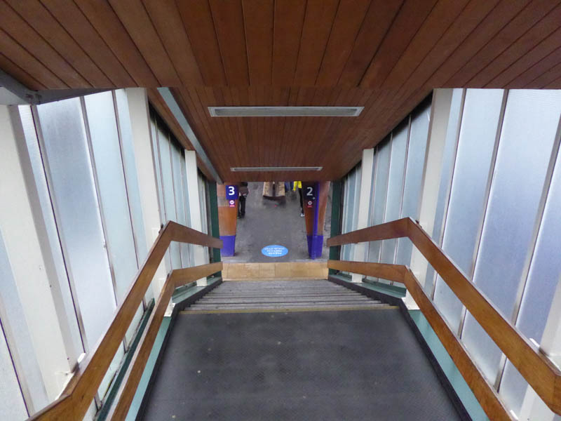 The steps down to platforms 2 and 3 from the footbridge