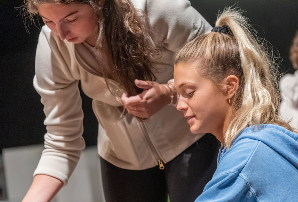 Two students in art class