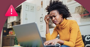 woman confused by whats on her laptop